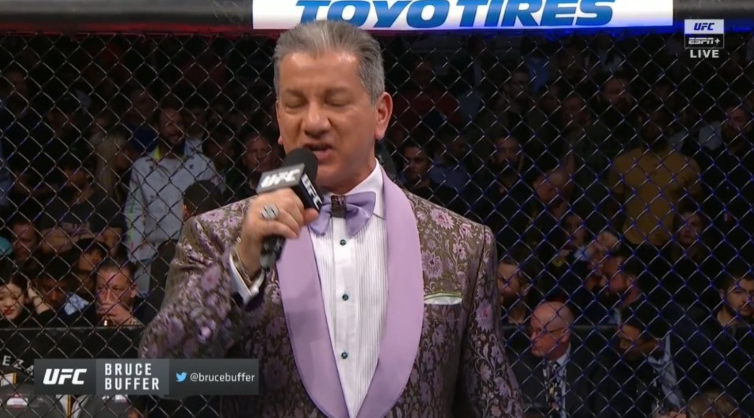PHOTO Bruce Buffer Wearing His Grandma's Purple Curtains On His Suit