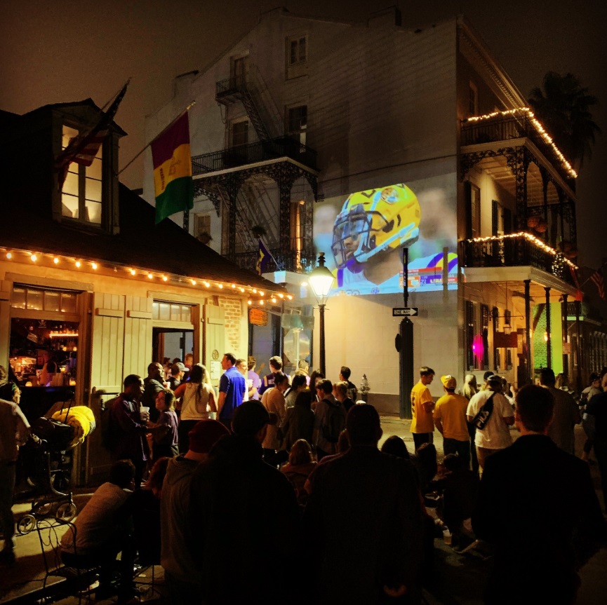 PHOTO LSU Clemson National Title Game Projected On The Side Of French Quarter Building In NOLA
