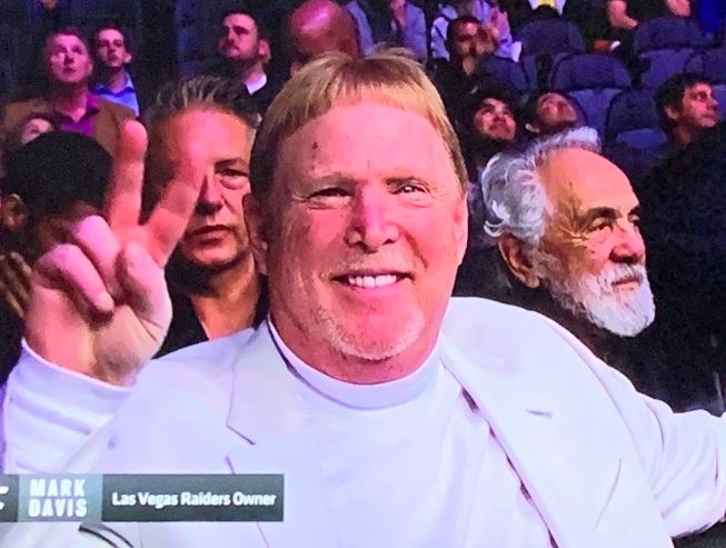 PHOTO Mark Davis Gives Peace Sign With Standard Bowl Haircut Shown As Las Vegas Raiders Owner At UFC 246