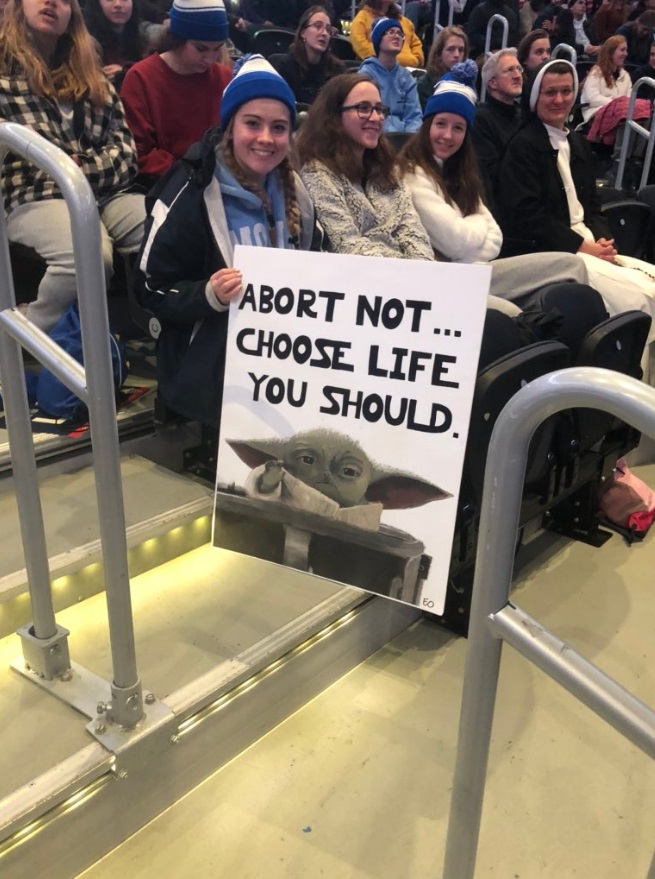 PHOTO Wizards Fan In DC At Capital One Arena Holding Up Sign That Says Abort Not Choose Life You Should