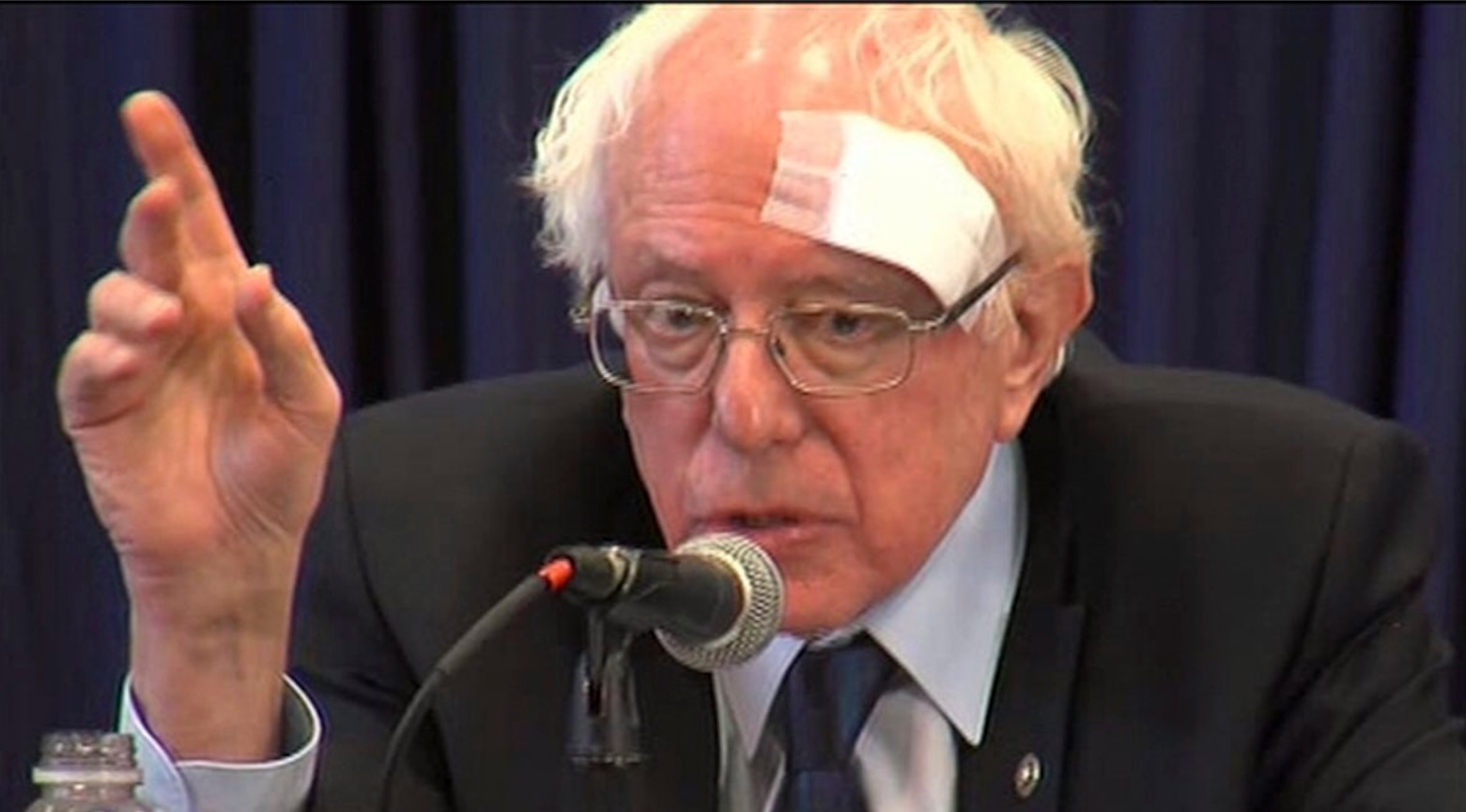PHOTO Bernie Sanders With Giant Bandaid On His Forehead During Speech