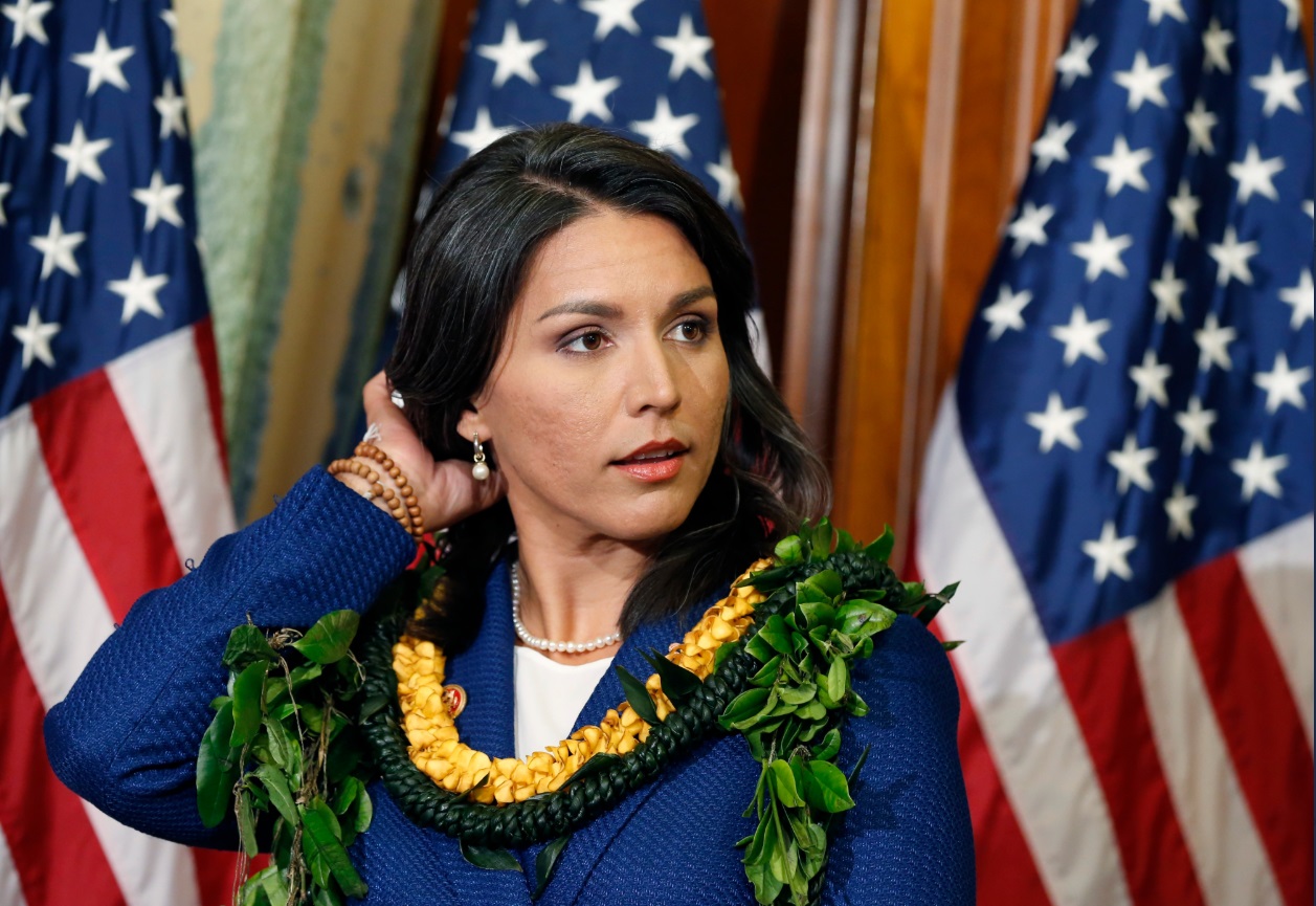 PHOTO Tulsi Gabbard Pulling Her Hair Back Away From Her Face