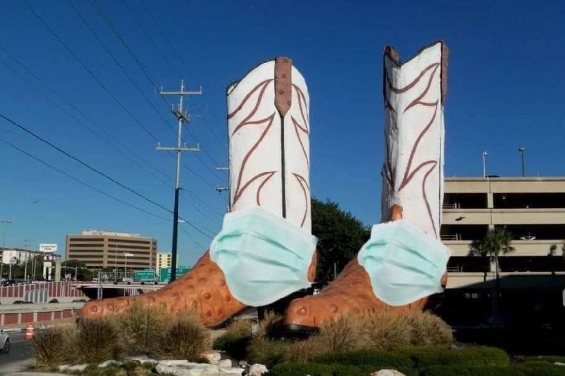 PHOTO Big Tex Boots In Dallas Have Corona Virus Masks On
