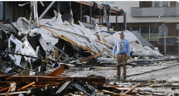 PHOTO Man Looks At Damage From Nashville Tornado Up To His Waist