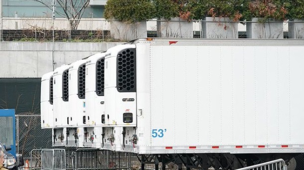 PHOTO Refrigeration Trucks Serving As Makeshift Morgue's Outside Manhattan Hospital For Corona Virus Patients