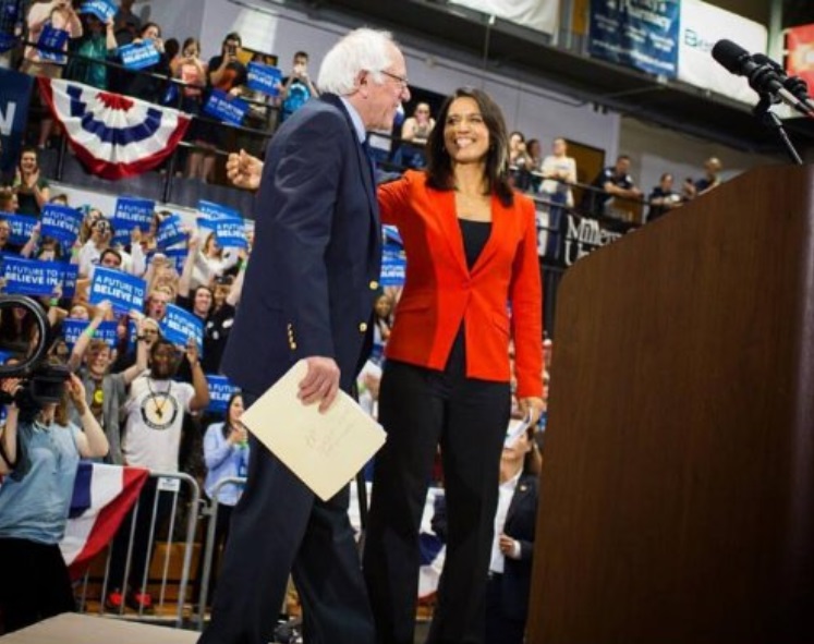 PHOTO Tulsi Gabbard Looking Deep Into Bernie Sanders Eyes Like She Can Feel The Bern