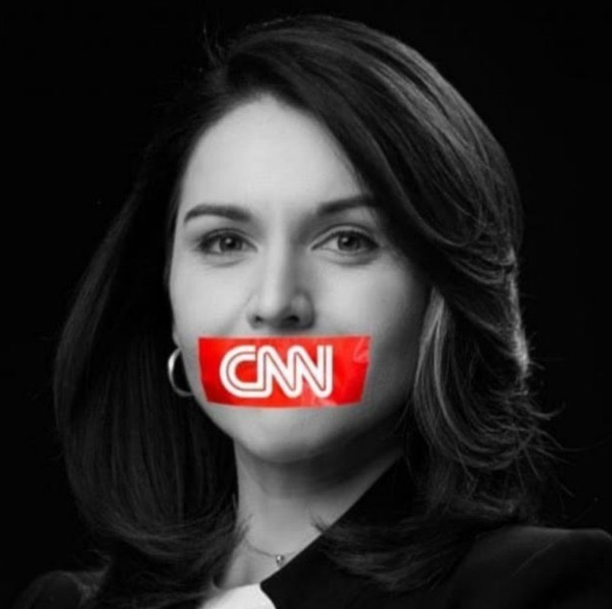 PHOTO Tulsi Gabbard Wearing Tape On Her Mouth That Says CNN