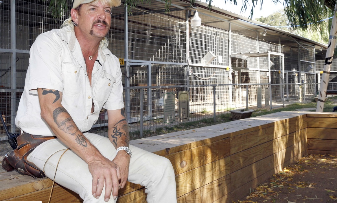 PHOTO Joe Exotic Has A Man's Face Tattooed On His Right Arm