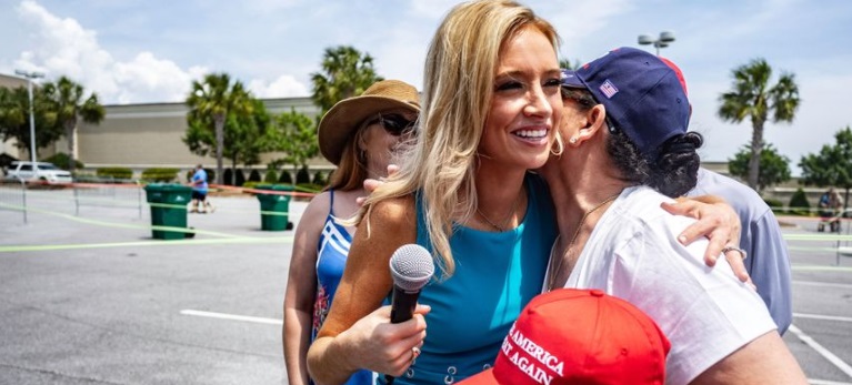 PHOTO Kayleigh Mcenany Hugging Trump Supporter Outside Of Rally