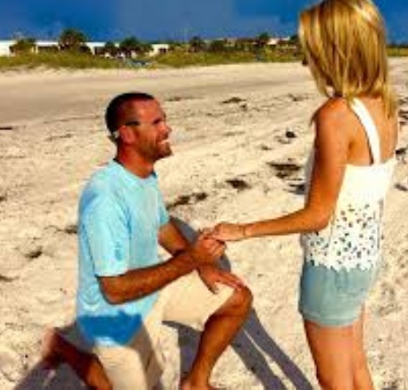 PHOTO Kayleigh Mcenany's Husband Proposing To her On The Beach