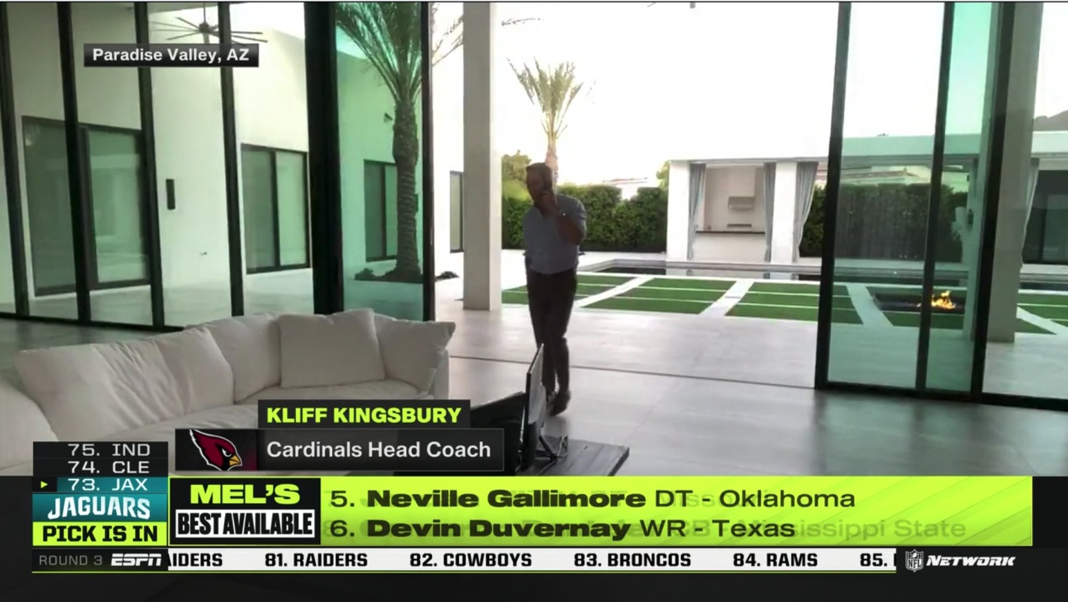 PHOTO Kliff Kingsbury Opened The Massive Glass Doors To His Massive Backyard To Walk Around While On The Phone And He's Got His Fire Pit Going In 95 Degree Weather