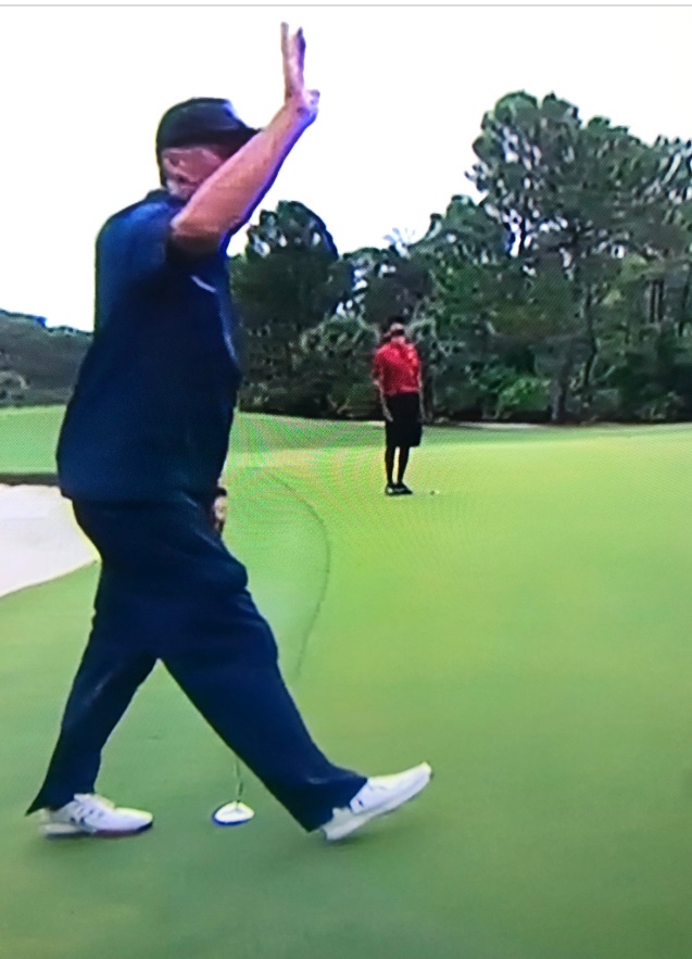 PHOTO Tom Brady High Fiving Air While Tiger Woods Looks Up At Sky Behind Him