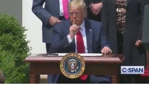 PHOTO Donald Trump Ssshing The Media With His Finger