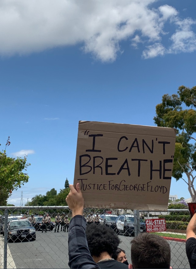 PHOTO Sheriff's On Other Side Of Fence During Carson California Protests