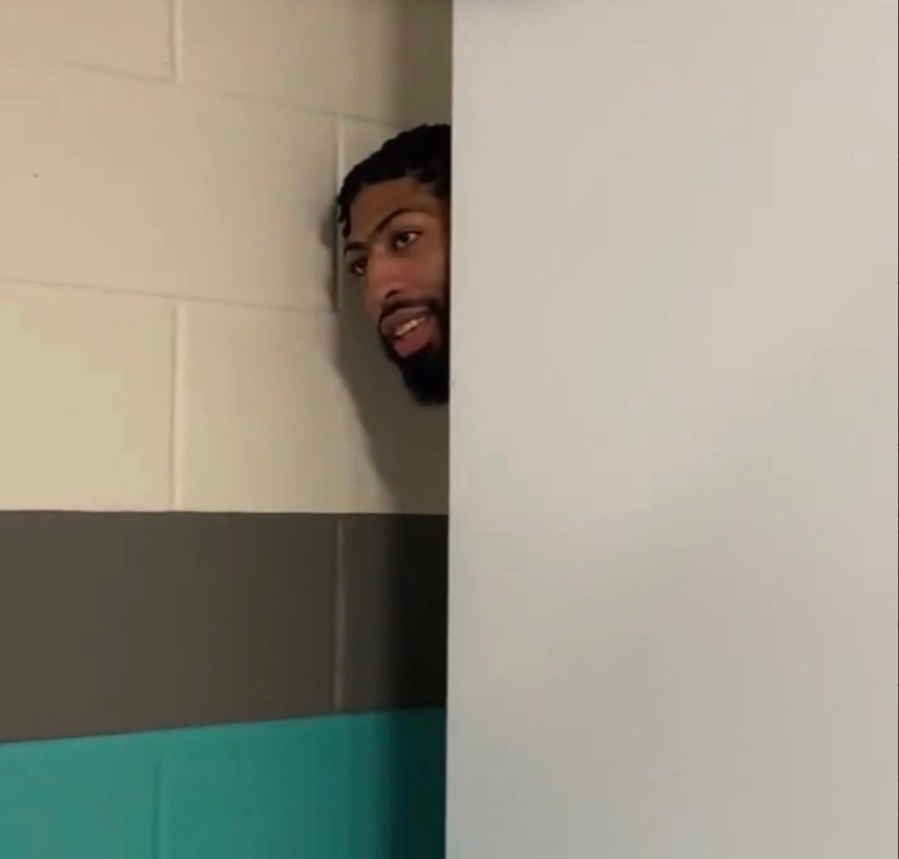 PHOTO Anthony Davis In The Orlando Bubble Hotel Hallroom Sneaking Into Lebron's Room Asking Bron Bron For A Kiss Goodnight