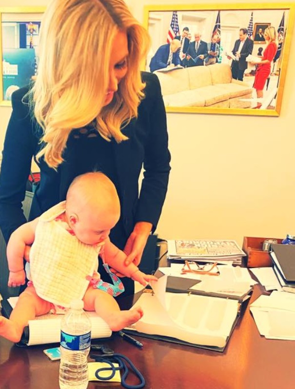 PHOTO Kayleigh McEnany's Daughter Flipping Pages In Her Press Box In Diaper